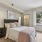 Secondary bedroom with ceiling fan